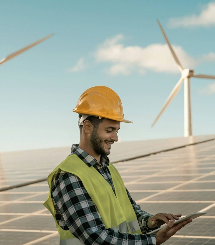 young-engineer-watching-on-digital-tablet-the-new-green-plan-for-alternative-energy